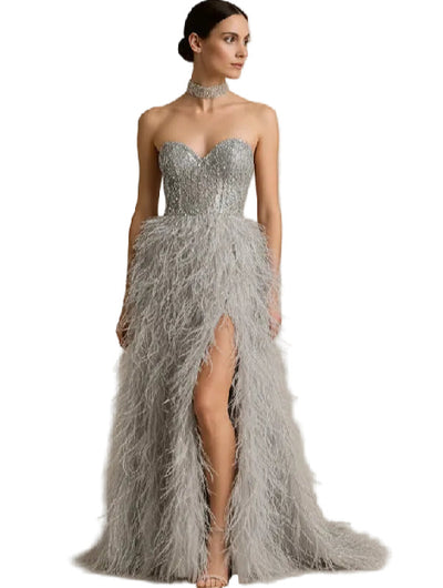 Strapless beaded bodice, feathered skirt, slit